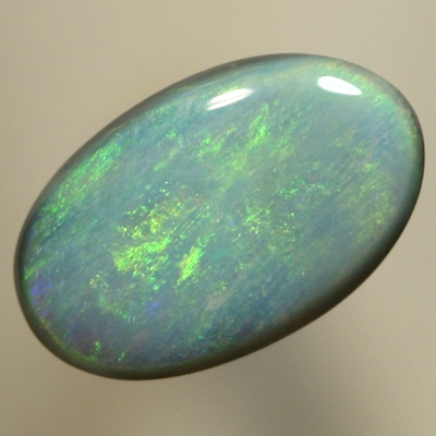 SOLID SEMI BLACK OPAL Even play of colour, orange and green over blue
